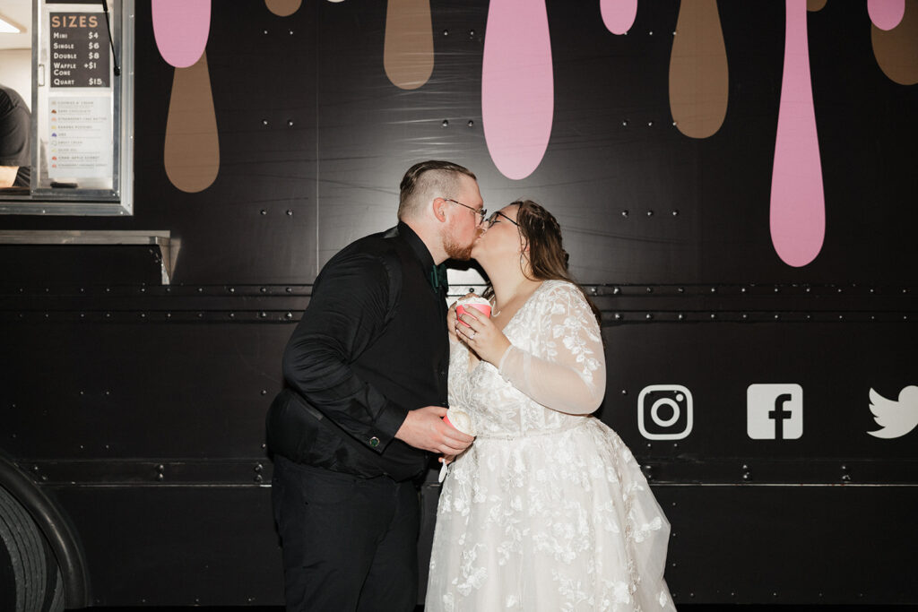 cute picture of the newlyweds kissing