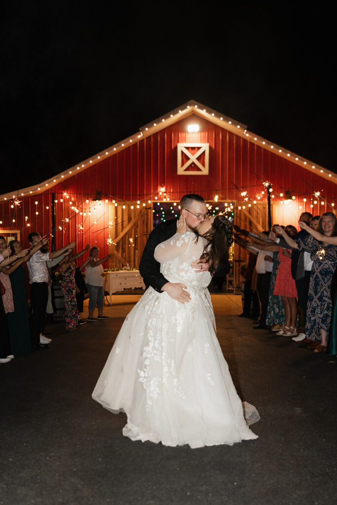 cute couple kissing after their reception party