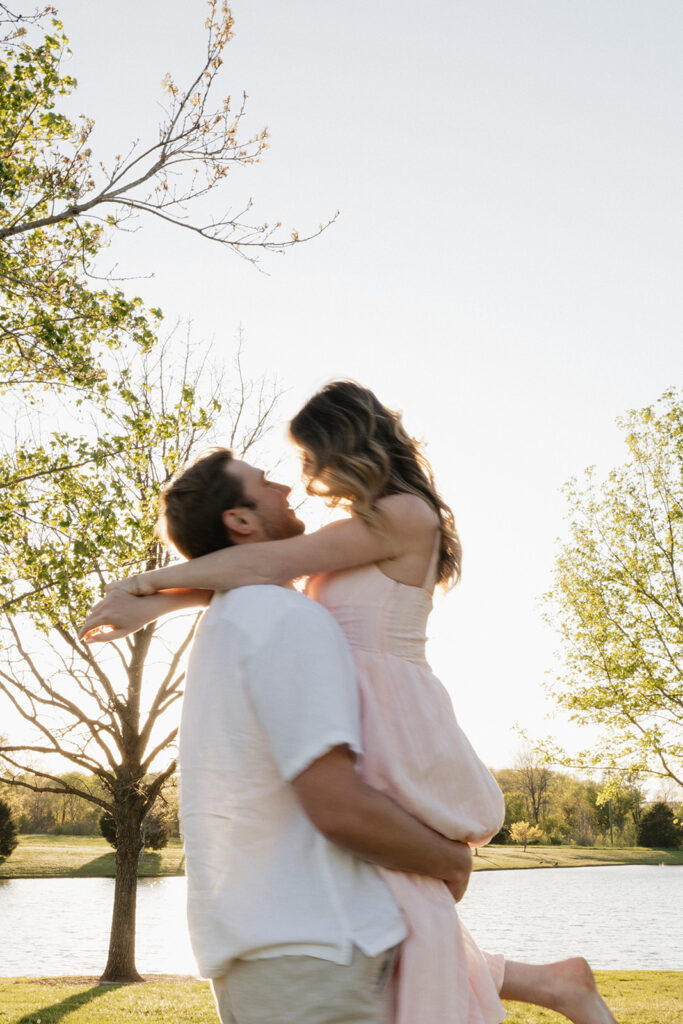 newly engaged couple dancing during thier photoshoot