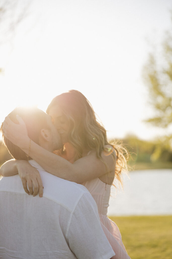 couple kissing during their golden hour photoshoot