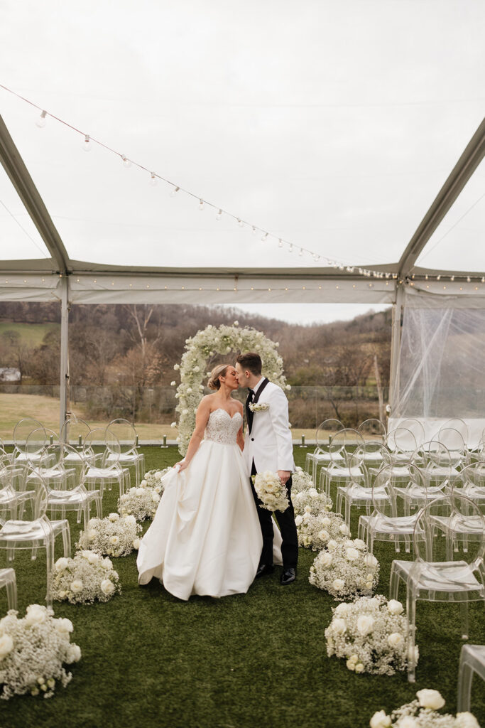 picture of the newlyweds kissing during their bridal portraits