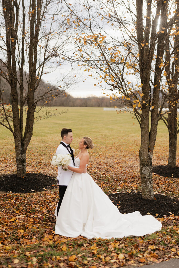 cute picture of the newlyweds smiling at each other