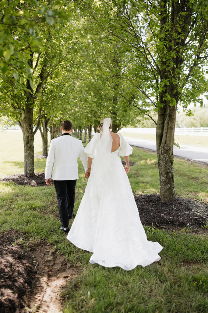 cute couple walking around their dream wedding venue