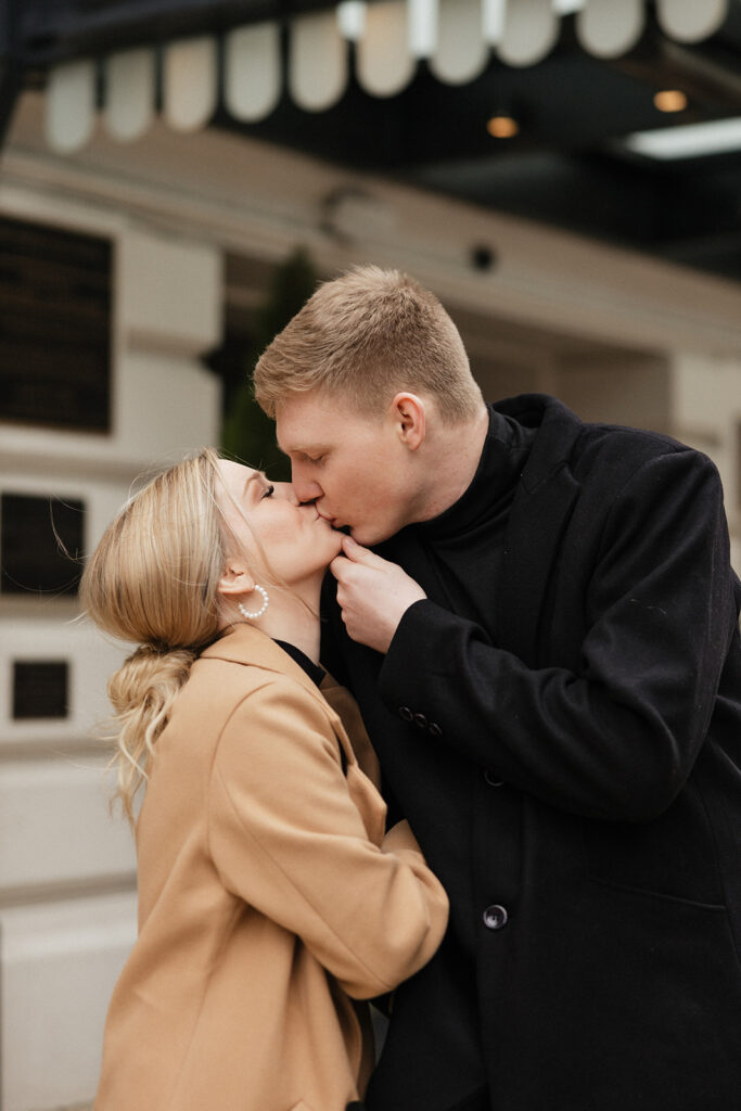cute picture of the couple kissing during their session