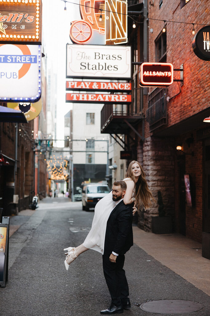 cute couple playing during their photoshoot