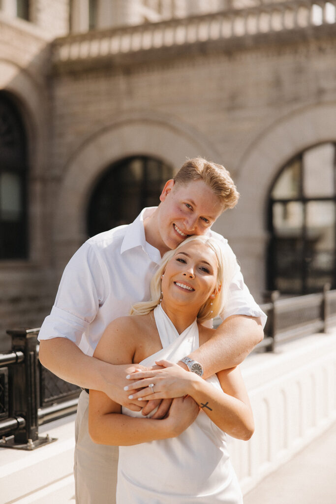cute couple smiling at the camera during their photoshoot in nashville
