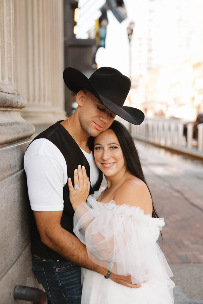 couple walking around downtown nashville during their session