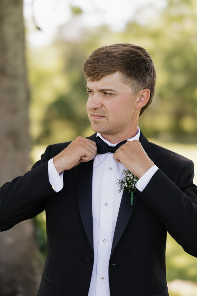 picture of the groom before heading to his first look with the bride