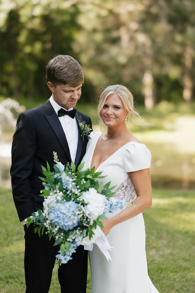 cute picture of the groom admiring the bride