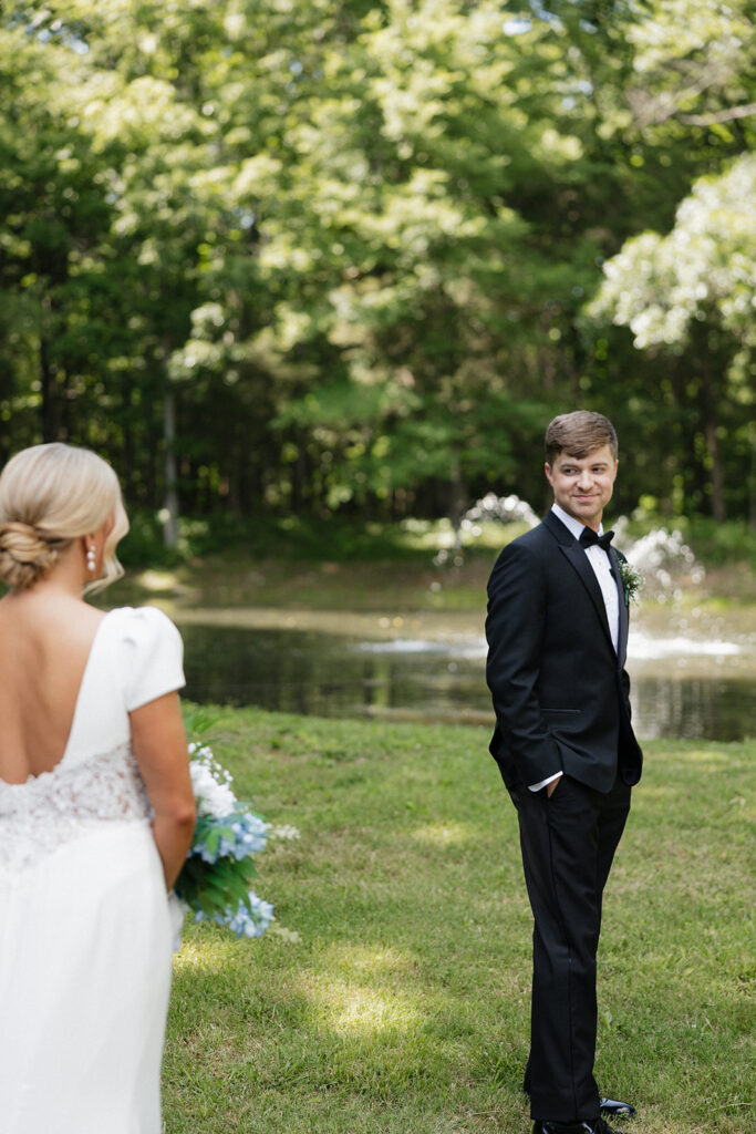 groom emotional seeing the bride in her wedding dress