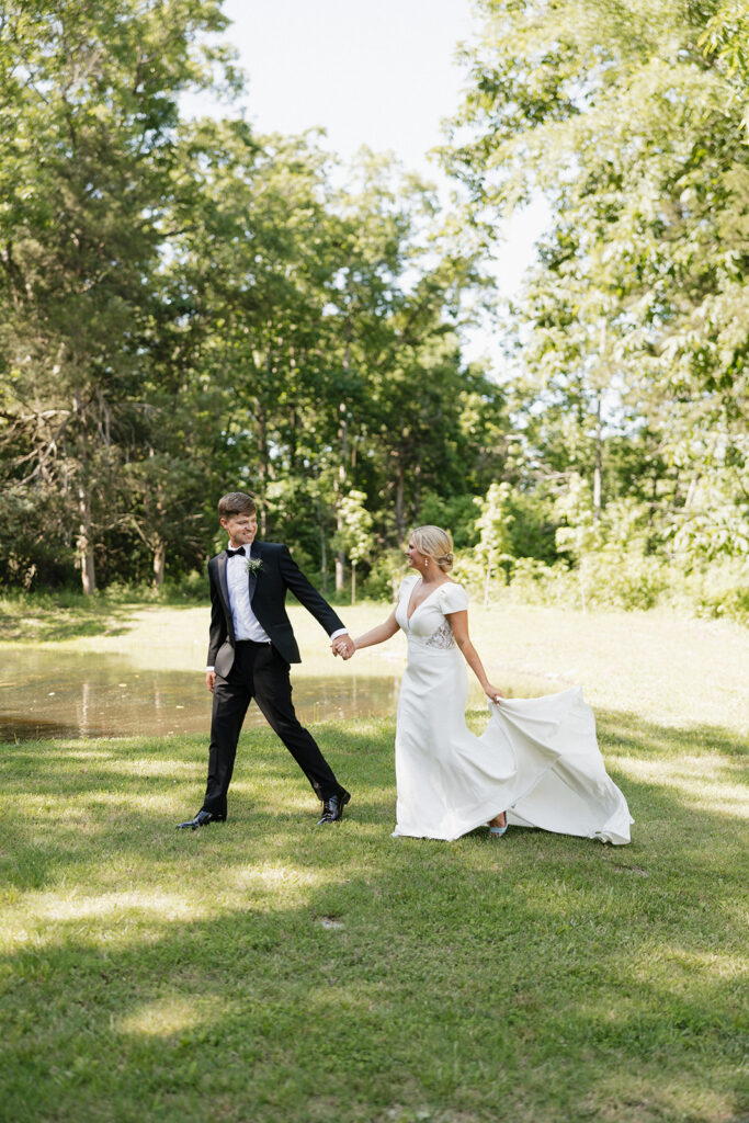 couple holding hands during their bridal portraits 