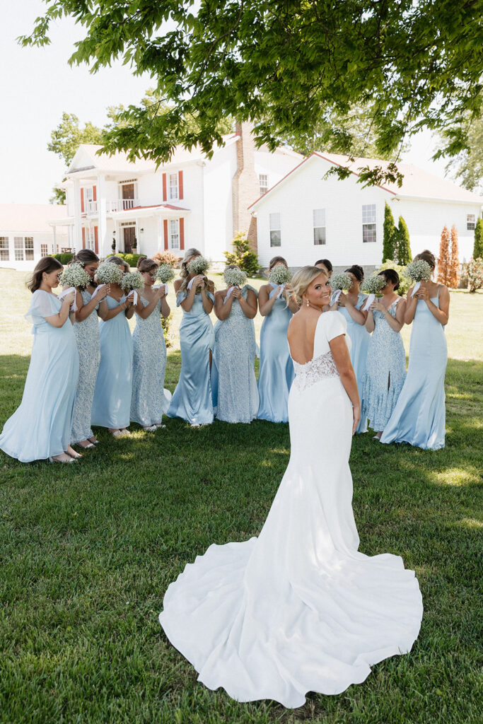 first look of the bride with her bridesmaids